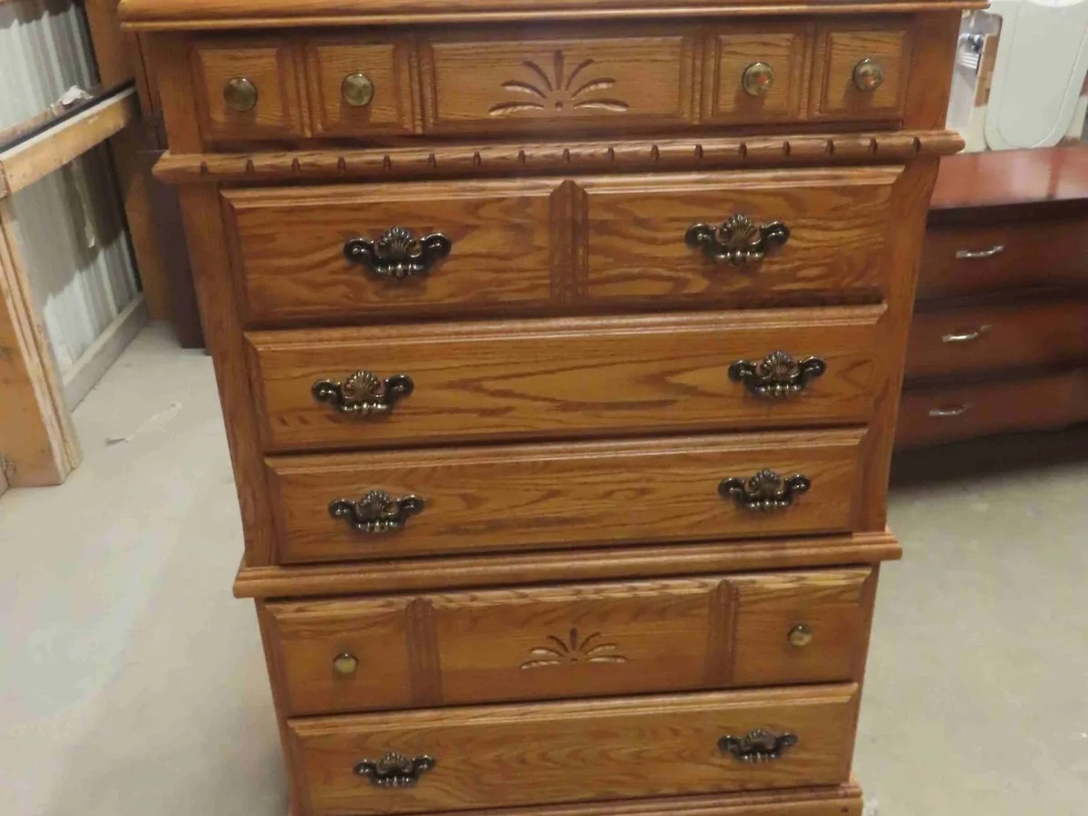 Oak six-drawer dresser with brass hardware