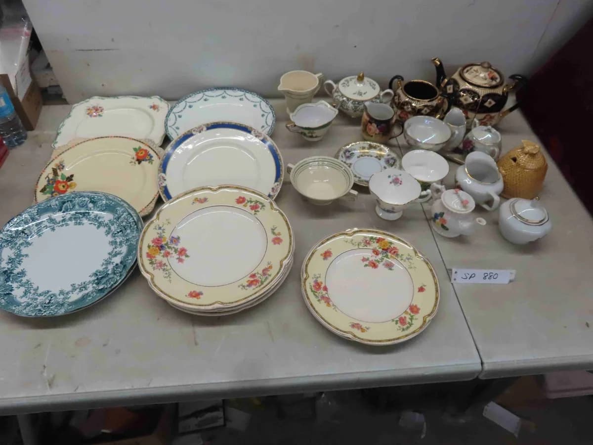 Floral china plates, teapot, creamers and serving pieces